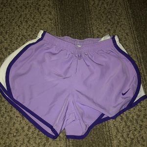 Purple and white nike shorts